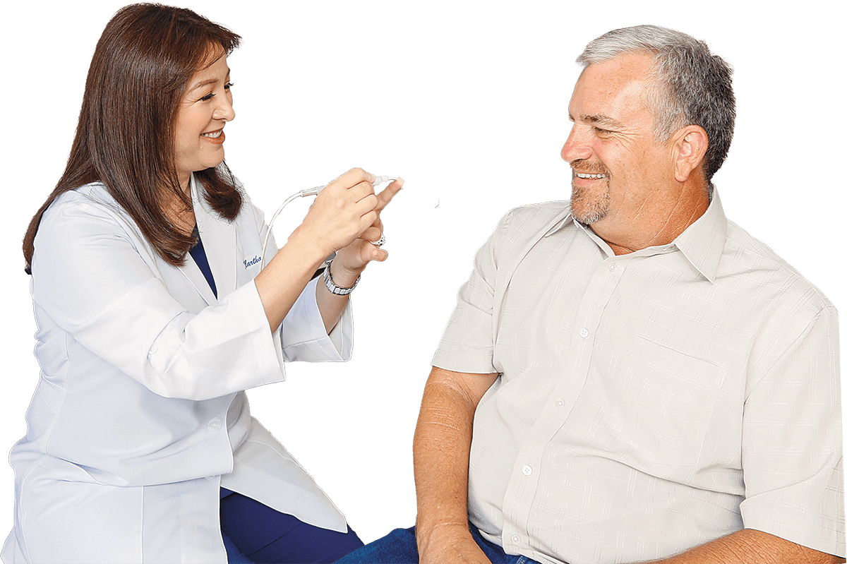 Dr. Sanger showing a patient a gum treatment